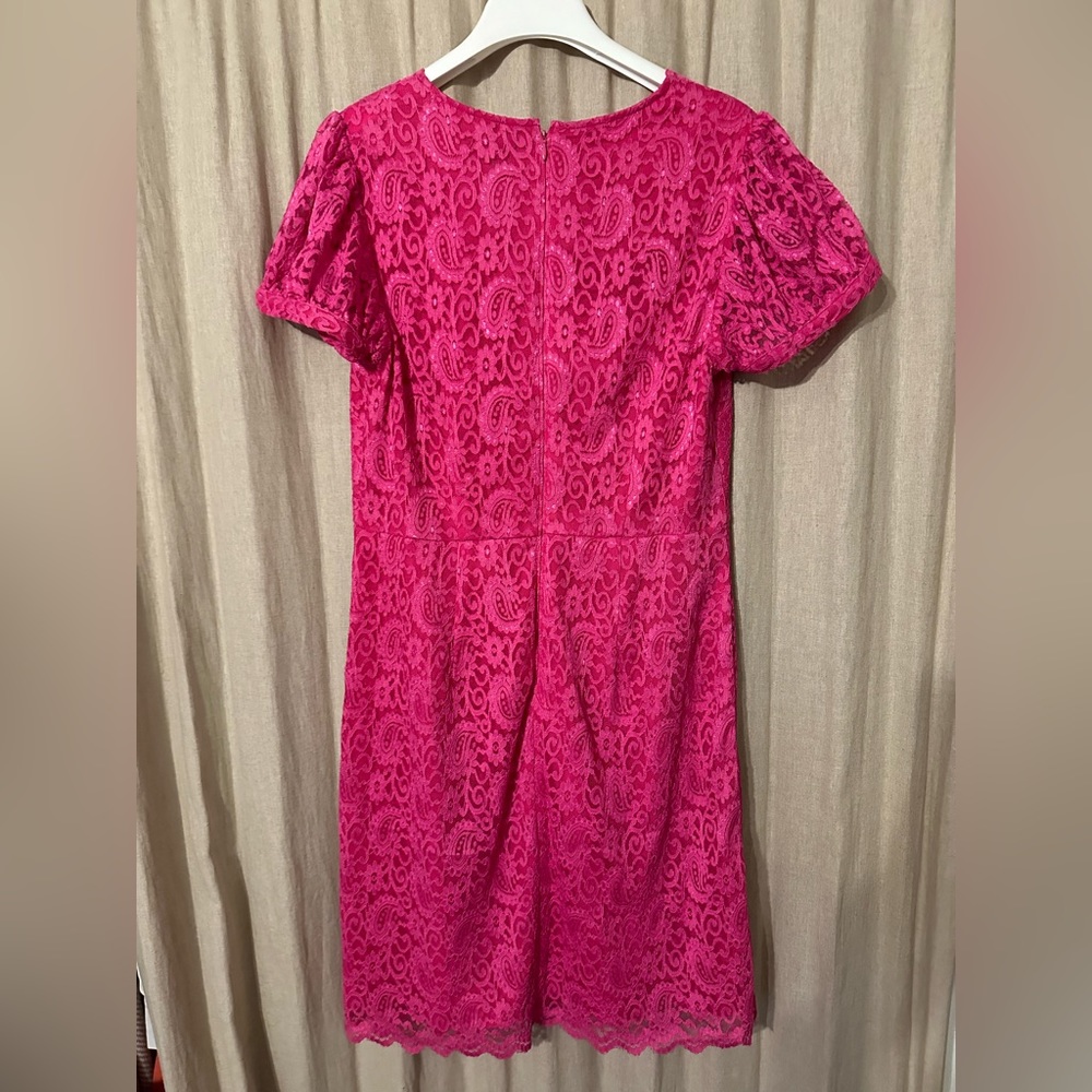 Pink lace shift dress with cap sleeves.